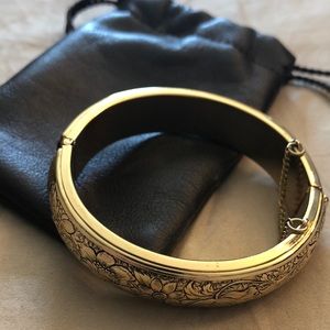 Gold embossed bracelet with Pouch